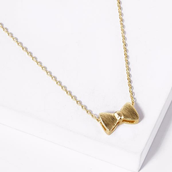 BOW CHARM GOLD DIPPED NECKLACE