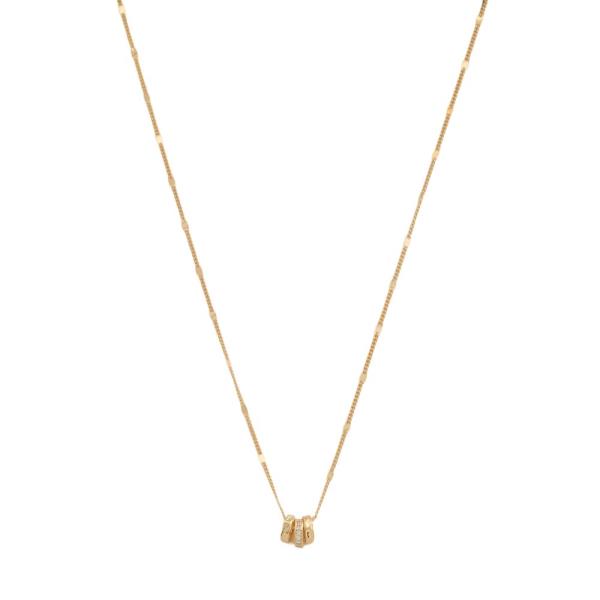METAL MULTI RING PENDANT NECKLACE