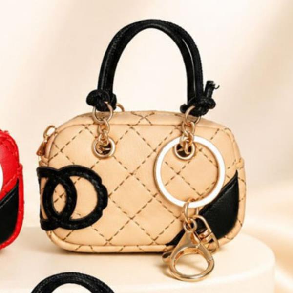 FAUX LEATHER QUILTED MINI DUFFLE BAG CHARM KEYCHAIN