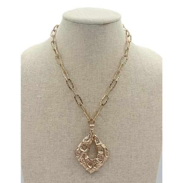 Worn Gold Chain and Pendant Necklace