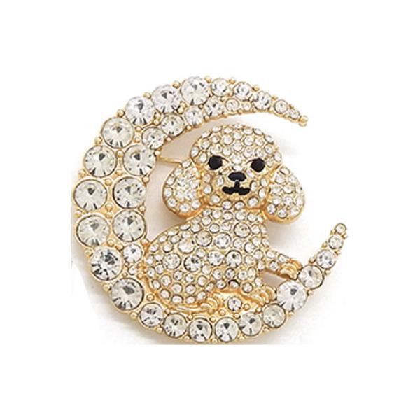 BROOCH SHAPED LIKE A CRESCENT MOON ENCLOSING A POODLE