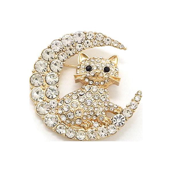 BROOCH SHAPED LIKE A CRESCENT MOON ENCLOSING A CAT