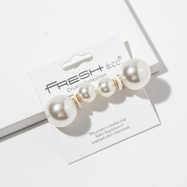 DOUBLE SIDED PEARL EARRING